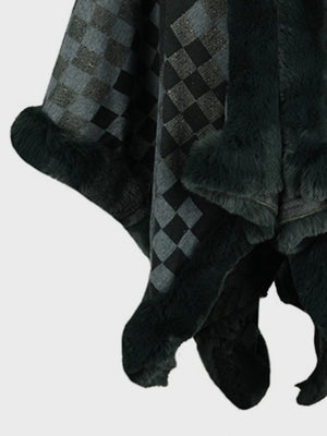 Checkered cape in black and grey with faux fur trim.