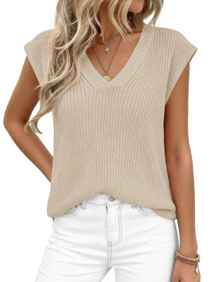 Textured apricot V-neck sweater vest with cap sleeves.