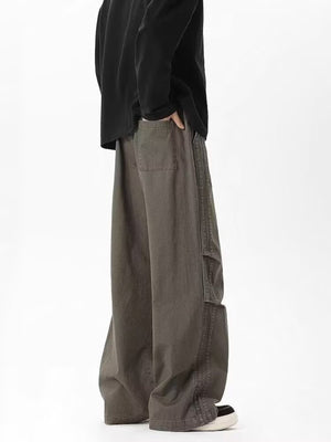 Men's plus size green drawstring cargo pants with side pockets and a relaxed fit.