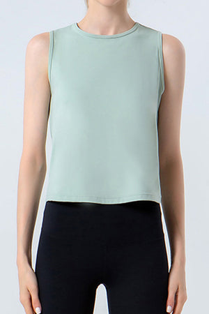 Light green sleeveless performance tank top with crew neck.