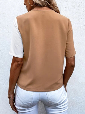 Two-tone shirt with brown and white colorblock, short sleeves, and a crew neck.