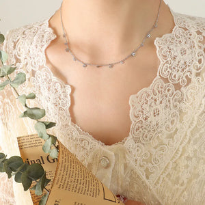 Silver Eye charm chain necklace with delicate eye charms and a dainty chain.