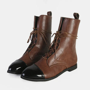 Dark brown lace-up ankle boots with black cap toes and brown laces.