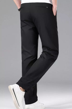 Men's black slim-fit stretch dress pants with a clean, modern cut.