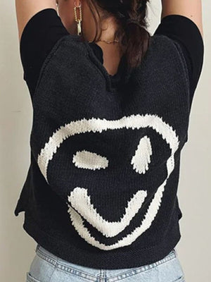 Black knit tank top with white smiley face graphic detail.