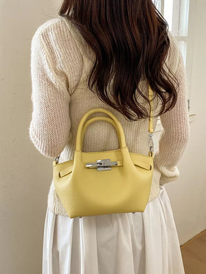 Top Handle Mini Crossbody Bag in Yellow, editorial view