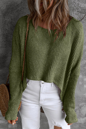 Moss green acrylic knit sweater with asymmetric hem and long sleeves.