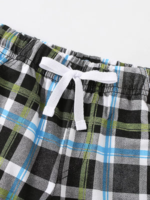 Baby shorts with plaid pattern and white drawstring detail.