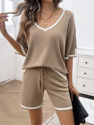 Mocha knit lounge set with contrast trim, V-neck top and drawstring shorts.