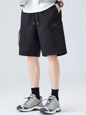 Black cargo shorts for men with drawstring waist and zip pocket detail.