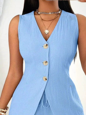 Sky blue button-down vest and shorts set with drawstring detail and gold buttons.