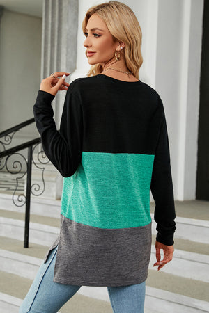 Colorblock long sleeve tee in black, teal, and gray with side slits