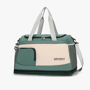 Utility Sport Weekend Bag in Sage and cream with mesh side pockets and front zip pocket.