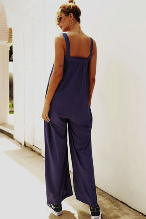 Dark Blue square-neck palazzo jumpsuit with pockets, shown from the back.