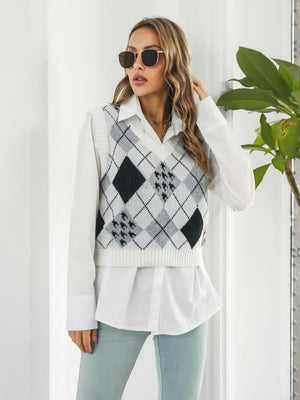 Argyle knit cropped sweater vest in white with V-neck and ribbed hem.
