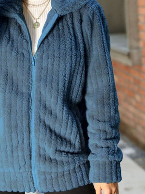 Plush ribbed collar zip-up jacket in Misty Blue with a full zip closure and pockets.