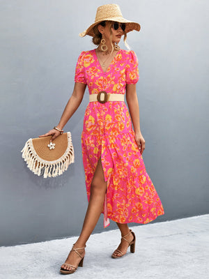 Hot pink floral print midi dress with puff sleeves, V-neck, and button front.