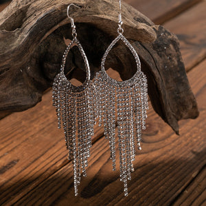Crystal raindrop chandelier earrings with cascading rhinestones on alloy metal.