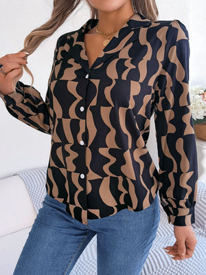Black and tan abstract wave print silk-touch blouse with button front and collar.
