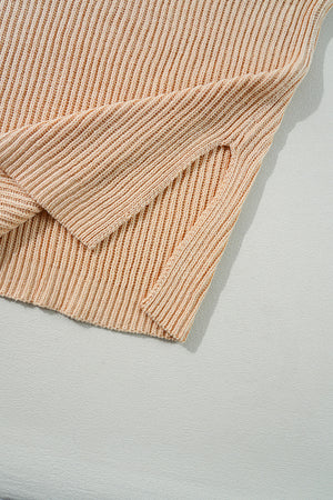 Tan ribbed knit pullover with asymmetric hem detail