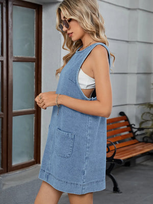 Light blue denim sleeveless pinafore dress with pockets and back detail