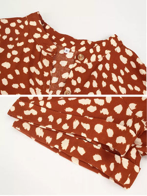 Orange animal print midi dress with button-down detail and tied waist
