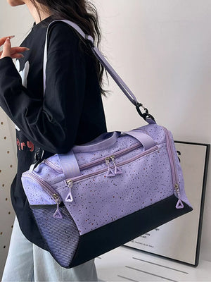 Chic speckled lavender travel bag with black contrast base and mesh side pocket.