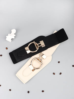 Black and cream elastic waist belts with gold hardware buckles