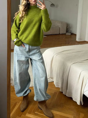 Relaxed mock neck knit sweater in moss green, acrylic blend, with long sleeves.