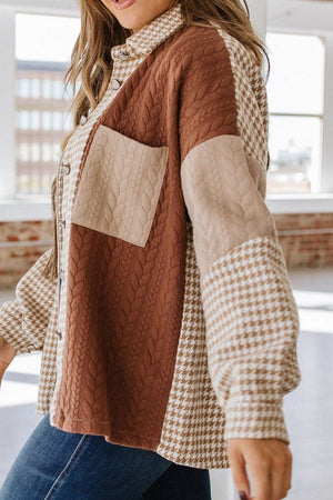 Panelled houndstooth quilted shacket in brown and tan with textured panels and a chest pocket.