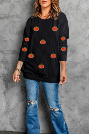 Black sweatshirt with allover embroidered pumpkins, crew neck, long sleeves.