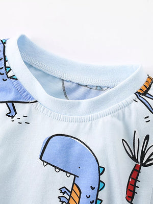 Light blue cotton t-shirt with playful blue dinosaur print and crew neck.