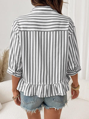Button-down shirt with ruffle hem in grey and white stripes, 3/4 sleeves, casual style.