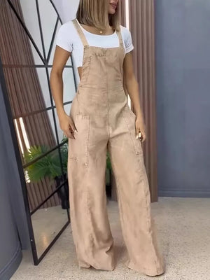 Khaki denim wide-leg overalls with bib front and pockets, styled with a white crop top.