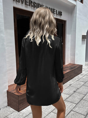 Black oversized blouse with Mandarin collar and balloon sleeves