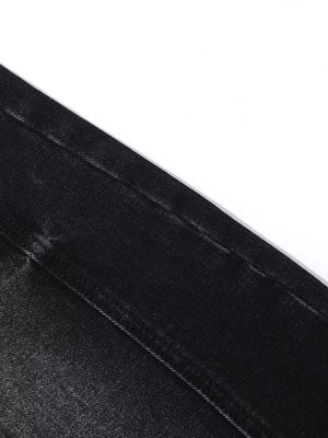 Belted wide leg denim jeans in black cotton with visible stitching detail.