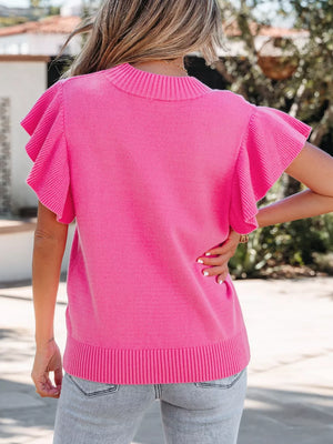 Pink knit top with ruffled short sleeves and relaxed fit.