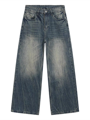 Men's blue baggy fit denim jeans with a faded wash and distressed details.