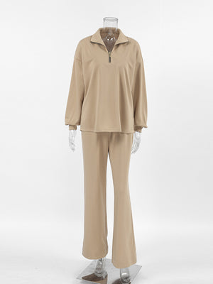 Camel quarter zip top and flared pants set with a relaxed fit.