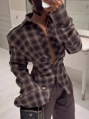 Chic ruched plaid long sleeve shirt with button front and cuffs.
