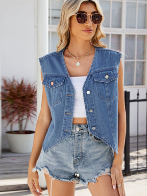 Boxy denim vest in dusty blue with button front and patch pockets.