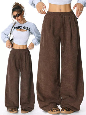 Brown corduroy maternity pants with wide legs and drawstring waist.