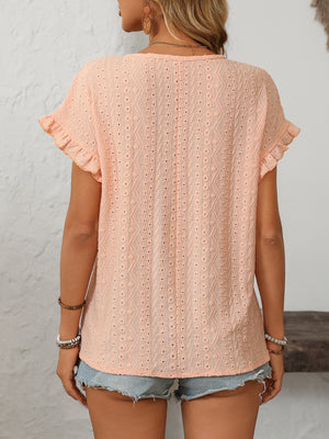 Peach eyelet knit blouse with ruffled short sleeves and V-neck.