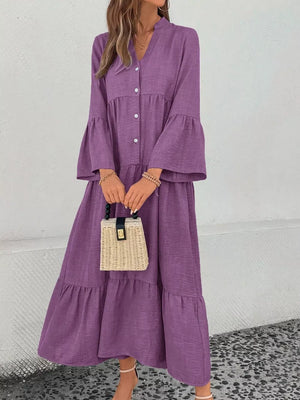 Purple tiered ruffle hem V-neck dress with button front and bell sleeves.