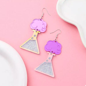 Funky science beaker dangle earrings in fuchsia pink with glitter accents and purple cloud tops.
