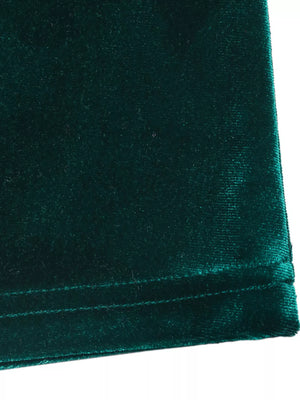 Green velvet maxi dress with ruched detail and V-neck.