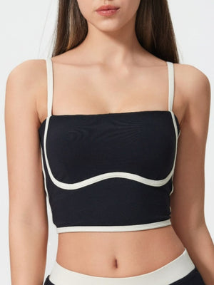Black contour-trimmed crop top with sculpted bust and white piping