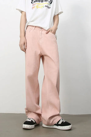 Flowing fit blush pink 100% cotton jeans with a relaxed cut.