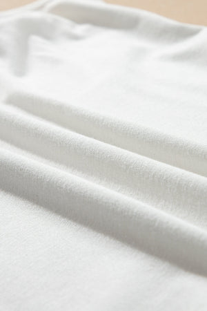 White sheer overlay tee and cami set fabric detail