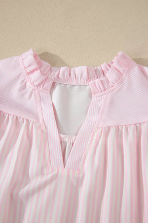 Pink and white striped polyester blouse with ruffled neckline and V-neck detail.